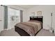 Comfortable bedroom with a neutral color scheme and a bright window with coverings at 3308 Country Walk Club Cir, Winter Haven, FL 33881