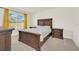 Primary bedroom showcases a large bed, side tables, and a window with natural light at 3308 Country Walk Club Cir, Winter Haven, FL 33881