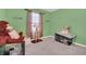 Playful bedroom with decor, stuffed animals and neutral carpet at 3308 Country Walk Club Cir, Winter Haven, FL 33881