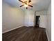 A spacious bedroom showcases new floors, a ceiling fan, and a walk-in closet at 3332 Robert Trent Jones Dr # 10703, Orlando, FL 32835