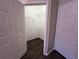 Spacious walk-in closet with wire shelving at 3332 Robert Trent Jones Dr # 10703, Orlando, FL 32835
