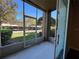 Enjoy the outdoors from this screened patio, offering relaxing community views at 3332 Robert Trent Jones Dr # 10703, Orlando, FL 32835