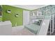 Charming ' bedroom with a playful jungle mural and a custom bunk bed with a built-in slide at 3356 Lilac Way, Davenport, FL 33897