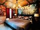 Pirate themed bedroom with skull pillows, ship wheel, and adventure movie mural at 3356 Lilac Way, Davenport, FL 33897