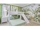 Charming ' bedroom with a playful jungle mural and a custom bunk bed with a built-in slide at 3356 Lilac Way, Davenport, FL 33897