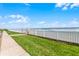Enjoy direct ocean views from this property with manicured lawn and a fence barrier at 3801 S Atlantic Ave # 105, New Smyrna Beach, FL 32169