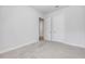 Bedroom featuring plush carpet and multiple interior doors at 388 Nowell Loop, Deland, FL 32724