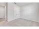 Bright bedroom featuring neutral walls and carpet with a large double door closet at 388 Nowell Loop, Deland, FL 32724