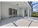 Covered patio featuring sliding glass doors that provide seamless indoor-outdoor living at 388 Nowell Loop, Deland, FL 32724