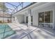 Backyard pool with an enclosure and covered patio, great for outdoor gatherings and leisure at 388 Nowell Loop, Deland, FL 32724