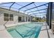 Backyard pool with an enclosure, set in a well-maintained outdoor living space at 388 Nowell Loop, Deland, FL 32724