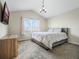 Neutral bedroom featuring vaulted ceiling, carpet flooring, and a window at 3908 Grassland Dr, Orlando, FL 32824