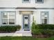 Inviting front entrance with tidy landscaping that enhances curb appeal at 3908 Grassland Dr, Orlando, FL 32824