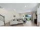 Bright living room featuring recessed lighting and sliding glass doors at 3908 Grassland Dr, Orlando, FL 32824