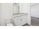 Bathroom vanity with white cabinets, granite countertop and a sink with chrome hardware at 4365 Switchgrass Ln, St Cloud, FL 34772