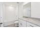 Bathroom showing white tile, shower-tub, granite-countertop vanity, and chrome fixtures at 4365 Switchgrass Ln, St Cloud, FL 34772