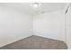 Bedroom featuring carpet, closet, a ceiling light, and smooth white walls at 4365 Switchgrass Ln, St Cloud, FL 34772