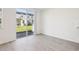 Bright living area with tile flooring and sliding glass doors to the yard at 4365 Switchgrass Ln, St Cloud, FL 34772