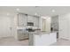 Modern kitchen featuring stainless steel appliances, granite countertops, and a central island at 4369 Switchgrass Ln, St Cloud, FL 34772