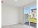 Bright room featuring tile flooring, recessed lighting, and sliding glass doors to the outdoor area at 4369 Switchgrass Ln, St Cloud, FL 34772