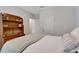 Cozy bedroom features neutral decor, a built-in hutch and plenty of natural light at 512 Stowers Dr, New Smyrna Beach, FL 32168