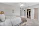 Cozy bedroom with a bed, closet, and neutral decor at 512 Stowers Dr, New Smyrna Beach, FL 32168