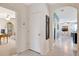 Bright hallway leading to the living room and other rooms in the home at 512 Stowers Dr, New Smyrna Beach, FL 32168