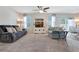 Inviting living room featuring plush sofas, a TV, and a dining area at 512 Stowers Dr, New Smyrna Beach, FL 32168