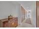 Bright hallway with tile floors, built-in storage and wood details throughout at 605 Sweetbriar Rd, Orlando, FL 32806