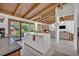 Spacious kitchen with a view to the outdoors and open to the living area at 605 Sweetbriar Rd, Orlando, FL 32806