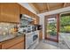 Charming kitchen with modern appliances and a view to the backyard at 605 Sweetbriar Rd, Orlando, FL 32806