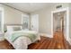 Bedroom with hardwood floors, neutral walls and natural light at 619 Woodward St, Orlando, FL 32803