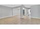 Open living room with light walls, tile floors, and natural lighting at 626 Golden Sunshine Cir, Orlando, FL 32807