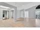 Bright living room with tile floors, recessed lighting, and backyard access at 626 Golden Sunshine Cir, Orlando, FL 32807