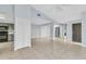 Bright living room featuring tile floors, neutral walls, and modern lighting at 626 Golden Sunshine Cir, Orlando, FL 32807