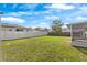 Lush backyard provides ample space for recreation and relaxation at 649 Caribou Ct, Poinciana, FL 34759
