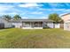 Expansive, well-kept backyard with a white fence for privacy and security at 649 Caribou Ct, Poinciana, FL 34759