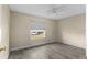 Bedroom featuring neutral colored walls, tiled floors, and ceiling fan at 649 Caribou Ct, Poinciana, FL 34759