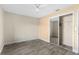 Bedroom with tiled floors, neutral walls and closet with mirror doors at 649 Caribou Ct, Poinciana, FL 34759