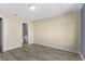 Bedroom with tiled floors and a view into the en-suite bathroom at 649 Caribou Ct, Poinciana, FL 34759
