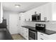 Well-equipped kitchen featuring stainless steel appliances, and subway tile backsplash at 649 Caribou Ct, Poinciana, FL 34759