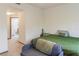 Comfortable bedroom with a view of an ensuite bathroom at 660 Celebration Ave # 220, Celebration, FL 34747