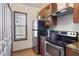 The kitchen features stainless steel appliances and ample cabinet space at 660 Celebration Ave # 220, Celebration, FL 34747