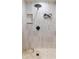 Modern shower with light-colored tiles and a rainfall shower head at 660 Celebration Ave # 220, Celebration, FL 34747