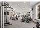Well-equipped fitness center with modern exercise machines and plenty of natural light at 7180 Oakmoss Loop, Davenport, FL 33837