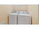 Functional laundry room with modern appliances, ensuring convenient laundry tasks at 7508 Toscana Blvd # 123, Orlando, FL 32819