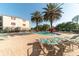 Sparkling community pool surrounded by lounge chairs, providing a perfect spot for relaxation and recreation at 8124 Claire Ann Dr # 303, Orlando, FL 32825
