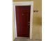 Exterior door with number plaque indicating the unit is 303 at 8124 Claire Ann Dr # 303, Orlando, FL 32825