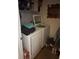Laundry room with a white washer and dryer set at 8124 Claire Ann Dr # 303, Orlando, FL 32825