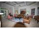 Inviting lobby with leather couches, armchairs, and a beautiful rug in a well-lit space at 8124 Claire Ann Dr # 303, Orlando, FL 32825